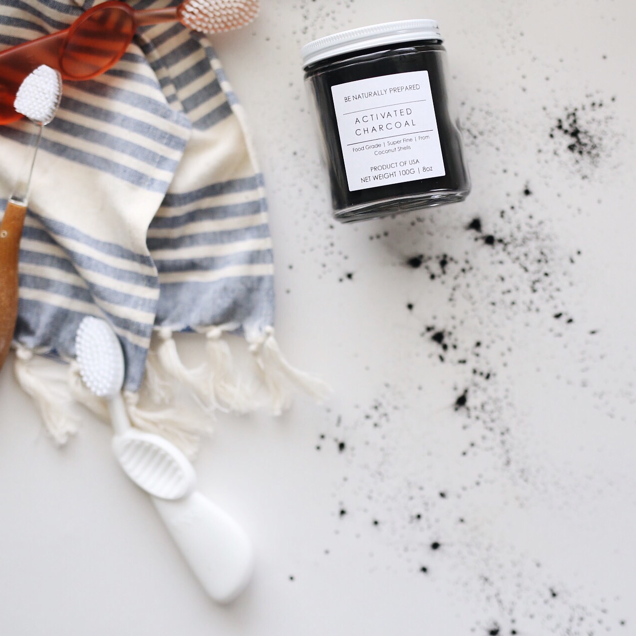 whitening your teeth with activated charcoal | elanaloo.com