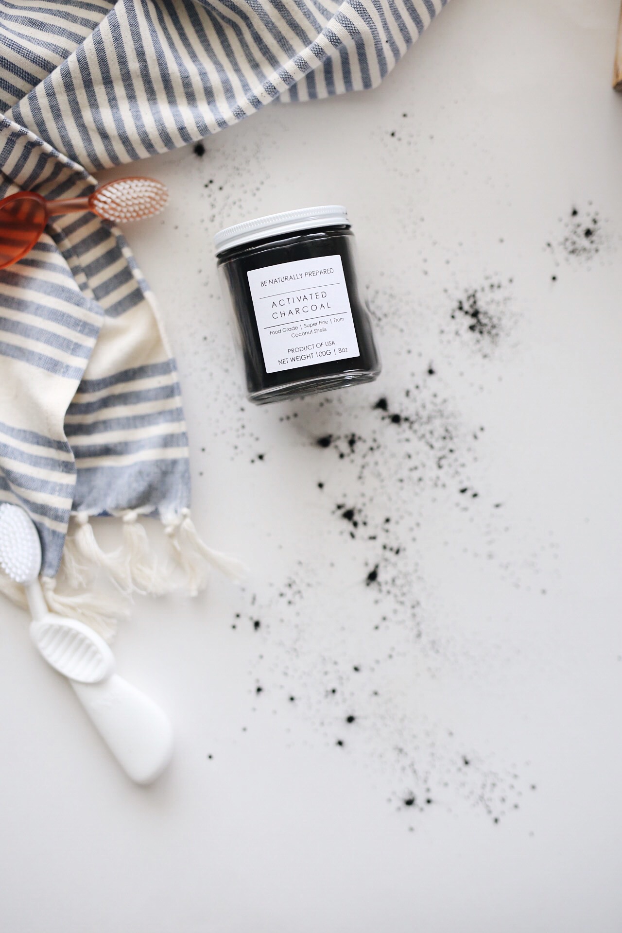 whitening your teeth with activated charcoal | elanaloo.com