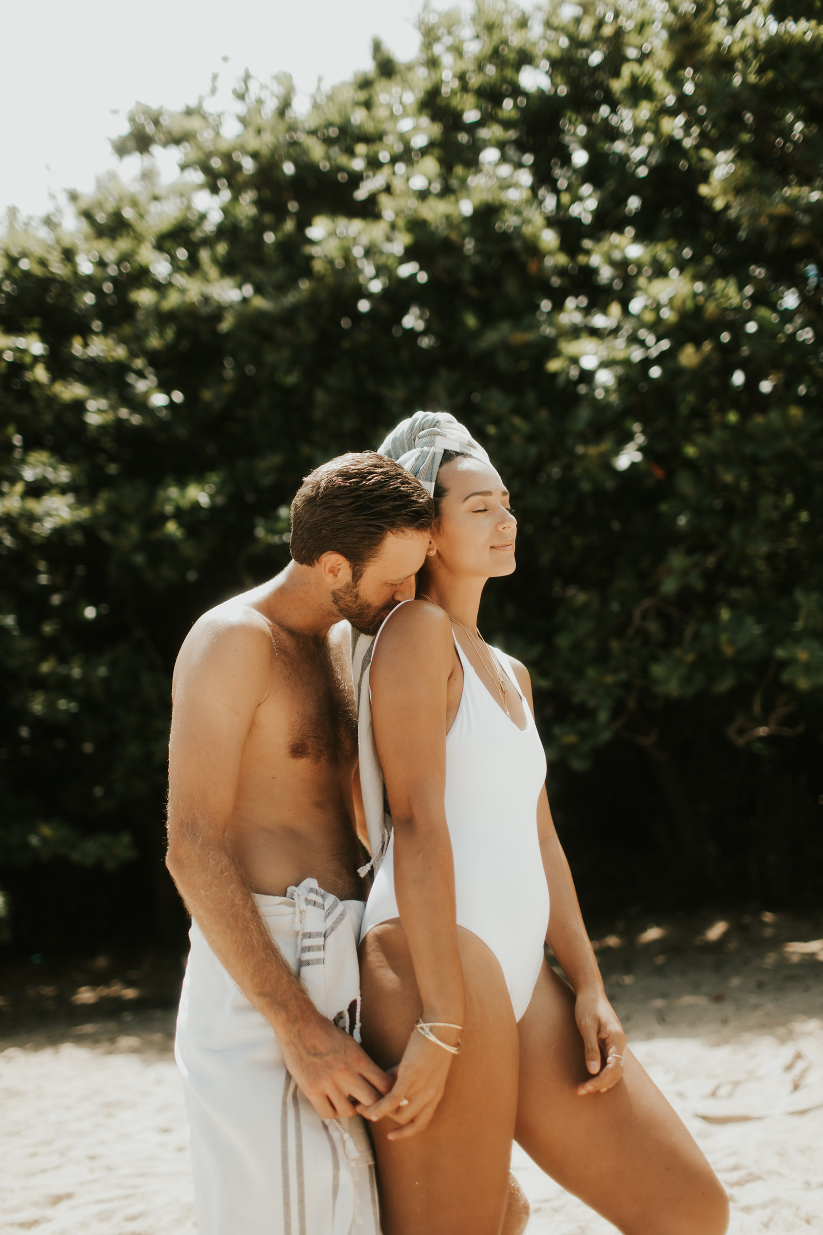 Couple wearing the BEST turkish towels from the ElanaLoo x Fair Seas Sustainably Made, Organic Cotton Turkish Towel Collection via @elanaloo + elanaloo.com
